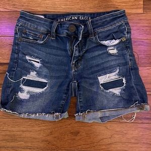 Dark blue ripped jean shorts